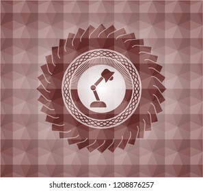 desk lamp icon inside red seamless badge with geometric pattern background.