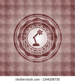 desk lamp icon inside red seamless polygonal badge.