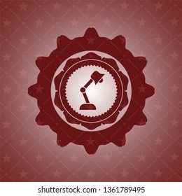 desk lamp icon inside red emblem