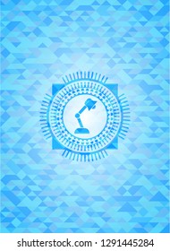 desk lamp icon inside sky blue emblem with triangle mosaic background
