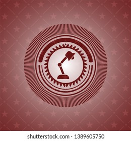 desk lamp icon inside vintage red emblem