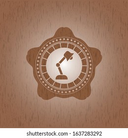 desk lamp icon inside wooden emblem. Vintage.