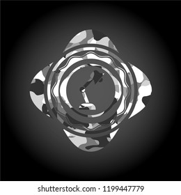 desk lamp icon on grey camouflaged pattern