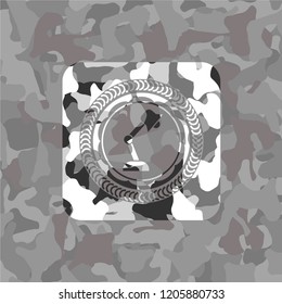 desk lamp icon on grey camouflage pattern