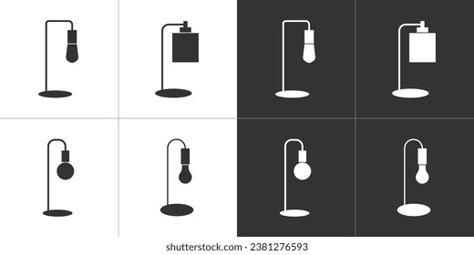 Desk lamp icon set on black and white background. Vector flat icons