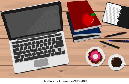 Desk with laptop, coffee, donut, apple, books and notebook. Office or education concept