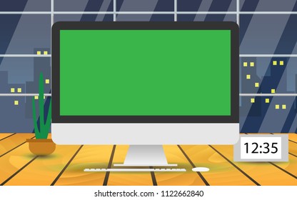 Desktop computer with green screen for placing advertising screen, poster, wallpaper.Place on the wooden table for advertise in the cafe with night landscape view of city