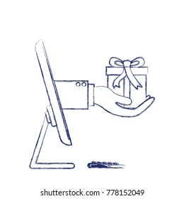 desktop computer and hand holding gift box of purchase online in dark blue blurred silhouette