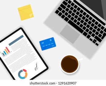 A desktop is a computer, a tablet, coffee, a bank card and stickers. A tablet has been signed on the tablet screen.