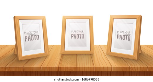 Desktop Empty wooden photo frames,stand on the table.Cartoon style, light color illustration.Realistic wood,transparent glass,3D element .Design Template For Mock Up.vector illustration.