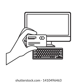 desktop with hand using credit card ecommerce icon