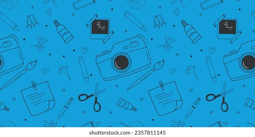 Desktop seamless doodle pattern. Minimalistic repeating printable image on a blue background. Camera, photography, marker, pencils, pastel scissors, paints, brush.