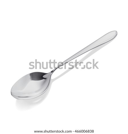Dessert spoon with its shadow on white