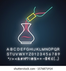 Dessert wine decantering neon light icon. Alcohol beverage pouring in decanter. Aperitif drink bottle. Barman, sommelier. Glowing sign with alphabet, numbers and symbols. Vector isolated illustration