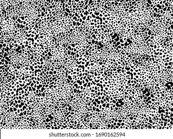 Detailed animal print seamless pattern with black spots on white background. Hand drawn animal print for fashion, textile, interior design. 