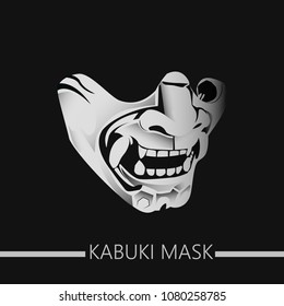 A detailed detailing of the white kabuki mask on a dark background