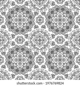 Detailed, hand-drawn seamless mandala vector pattern. This repeating line art is perfect for backgrounds, surface designs, and wallpaper.