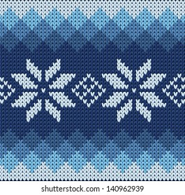 Detailed knitted blue jacquard pattern with white flowers