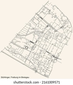 Detailed navigation black lines urban street roads map of the STÜHLINGER DISTRICT of the German regional capital city of Freiburg im Breisgau, Germany on vintage beige background