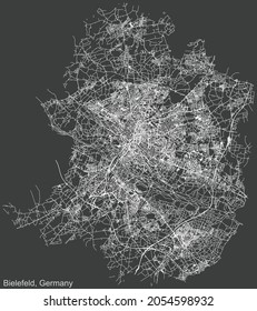 Detailed negative navigation urban street roads map on dark gray background of the German regional capital city of Bielefeld, Germany