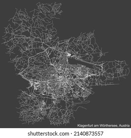 Detailed negative navigation white lines urban street roads map of the Austrian regional capital city of KLAGENFURT, AUSTRIA on dark gray background