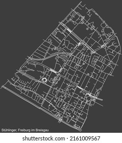 Detailed negative navigation white lines urban street roads map of the STÜHLINGER DISTRICT of the German regional capital city of Freiburg im Breisgau, Germany on dark gray background