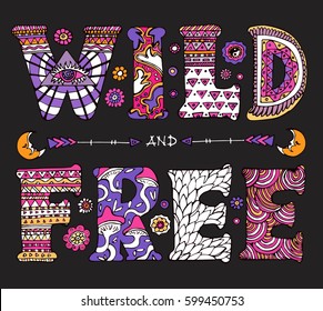 Detailed ornamental psychedelic "Wild and Free Spirit" quote design.Bright text isolated on black background.Boho chic style typographic elements for prints on t-shirts and bags or poster.Vector