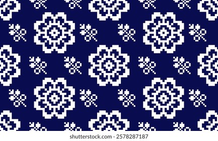 a detailed pattern composed of pixel designs with white flowers square on dark blue background , design for fabric or various pattern printing works.