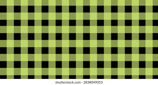 Detailed view of a checkered fabric pattern with green and black squares, emphasizing texture and color contrast.