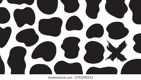 Detailed view of a cowhide with distinctive black and white irregular patches, showcasing natural animal fur pattern.