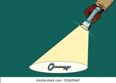 Detective flashlight beam shines on key. Pop art retro vector illustration