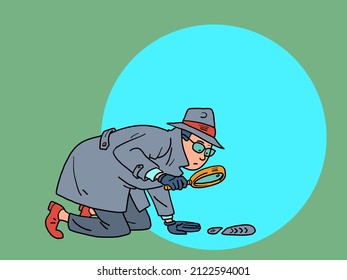 A detective with a magnifying glass examines the tracks. a private detective, a man in a coat, hat and glasses