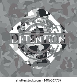 Detention on grey camouflaged texture