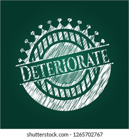 Deteriorate chalk emblem written on a blackboard