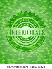 Deteriorate green emblem with triangle mosaic background