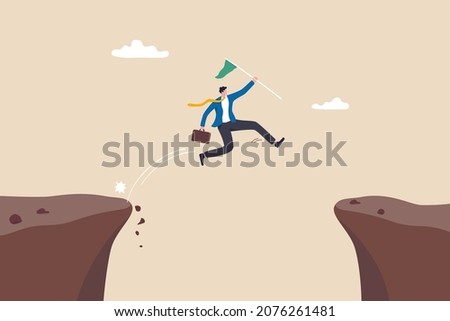 Determination and bravery to overcome obstacle and achieve business success, career challenge or motivation to win competition, determined businessman jump over cliff gap to achieve business target.
