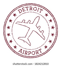 Detroit Airport stamp with an airplane in the center, surrounded by stars and text.