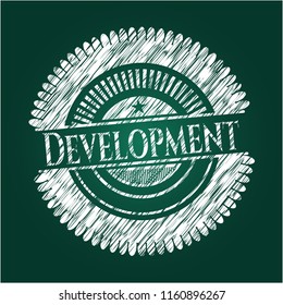 Development chalkboard emblem on black board