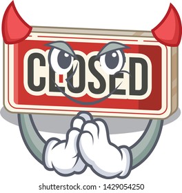 Devil closed sign attached to cartoon door