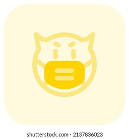 devil face expression double horns wearing the mask during the pandemic situation