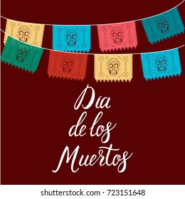 Dia de Los Muertos, Mexican Day of the Dead card, invitation. Party decoration, string of lights, handmade cut paper flags, skull, floral decor. Old wooden background.