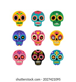 Dia de los muertos. Vector collection of Mexican traditional sugar skulls in various colors. Isolated on white.