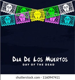 Dia De Muertos lettering in spanish on back background decorated with colorful party flags for Mexican festival celebration concept.