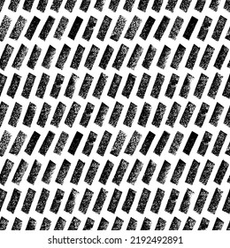 Diagonal bold charcoal short lines seamless pattern. Hand drawn black vector geometric ornament. Graphic dashed strokes pattern with dry texture. Retro black and white ornament. Dry brushstrokes