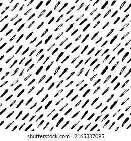 Diagonal dashed lines vector seamless pattern. Black irregular small dry lines. Black brush short strokes. Memphis style background with small dashes, retro black and white texture. Freehand texture
