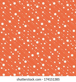 Diagonal dots and dashes seamless pattern in orange and beige 