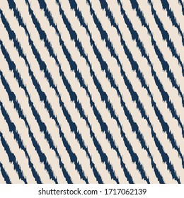 Diagonal ikat stripes. Geometric folklore ornament. Tribal ethnic vector texture. Seamless pattern in Aztec style. Folk embroidery. Indian, Scandinavian, Gypsy, Mexican, African rug.