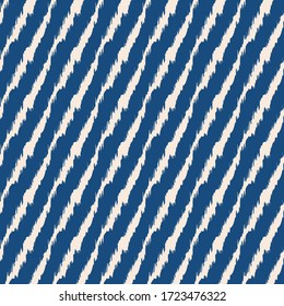 Diagonal ikat stripes. Geometric folklore ornament. Tribal ethnic vector texture. Seamless pattern in Aztec style. Folk embroidery. Indian, Scandinavian, Gypsy, Mexican, African rug.