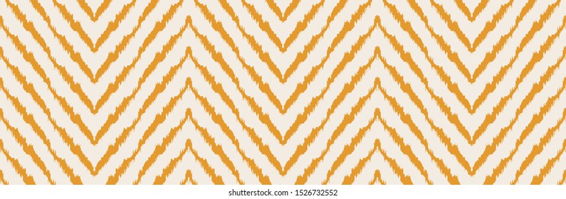 Diagonal ikat stripes. Zigzag pattern seamless. Geometric chevron abstract illustration, wallpaper. Tribal ethnic vector texture. Aztec style. Folk embroidery. Indian, Scandinavian,  African rug.