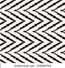 Diagonal ikat stripes. Zigzag pattern seamless. Geometric chevron abstract illustration, wallpaper. Tribal ethnic vector texture. Aztec style. Folk embroidery. Indian, Scandinavian,  African rug.
